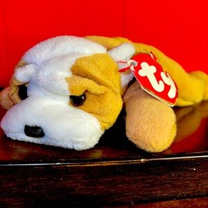 Ty Beanie Babies Wrinkles the Dog. Has Tags but are damaged.